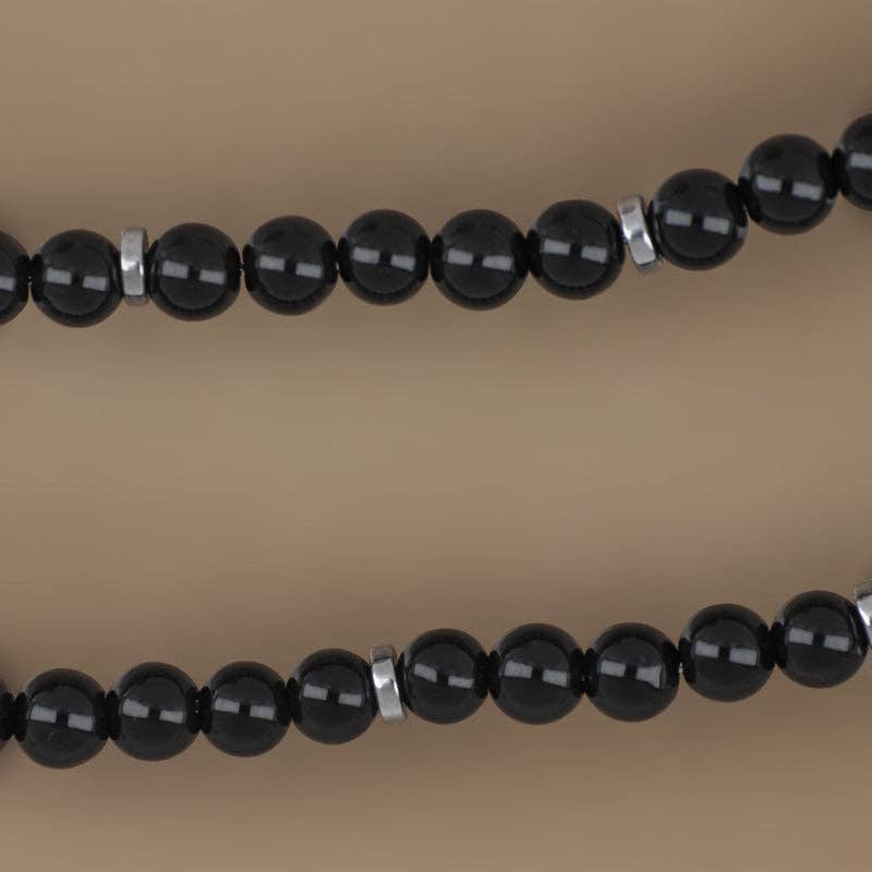 Collier pour homme en onyx et acier – collection Navajo GOYATÈ, style ethnique et symbolique.
