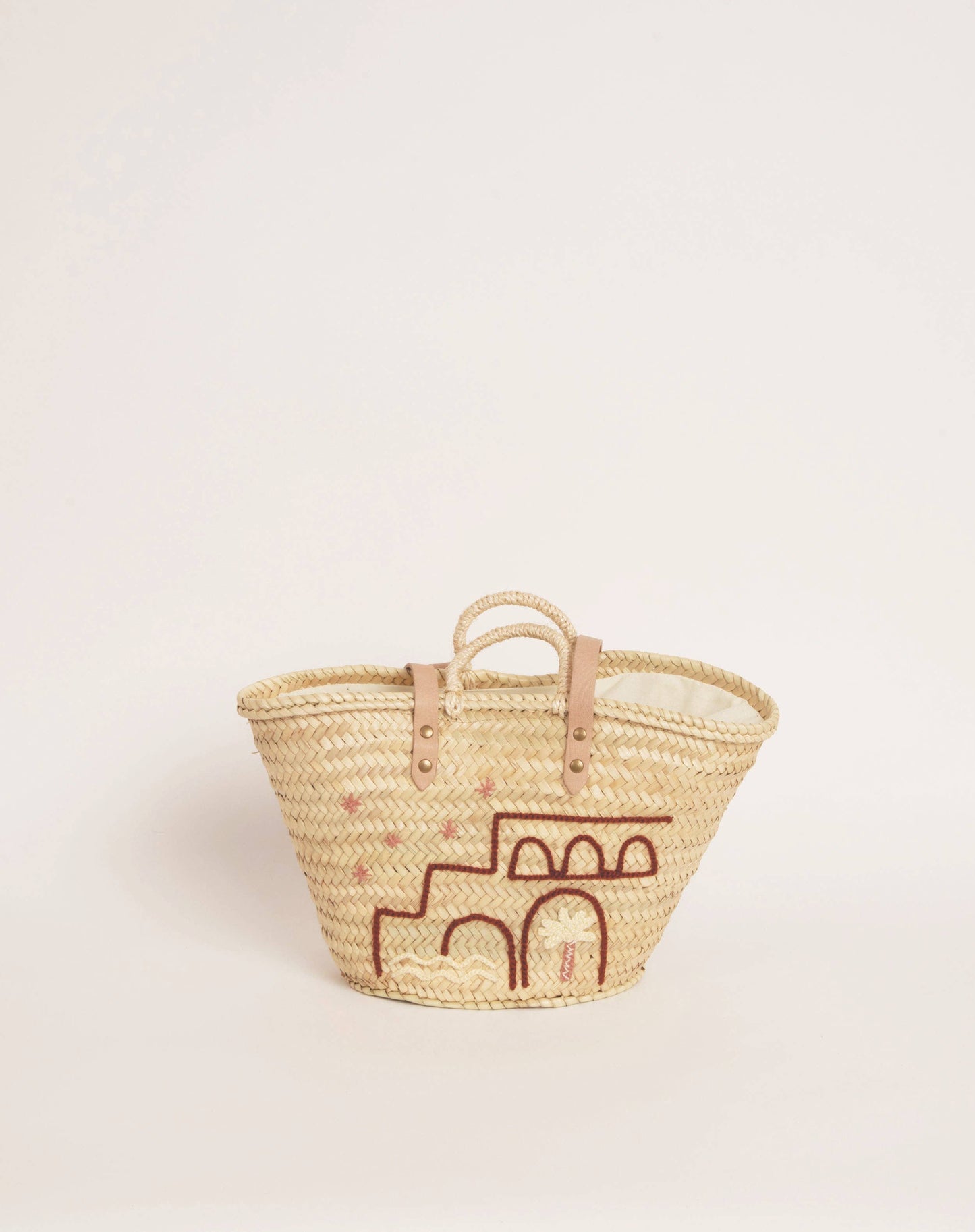 Panier en fibre de palmier tressée à la main avec lanières cuir et broderie rose “Mi casa”