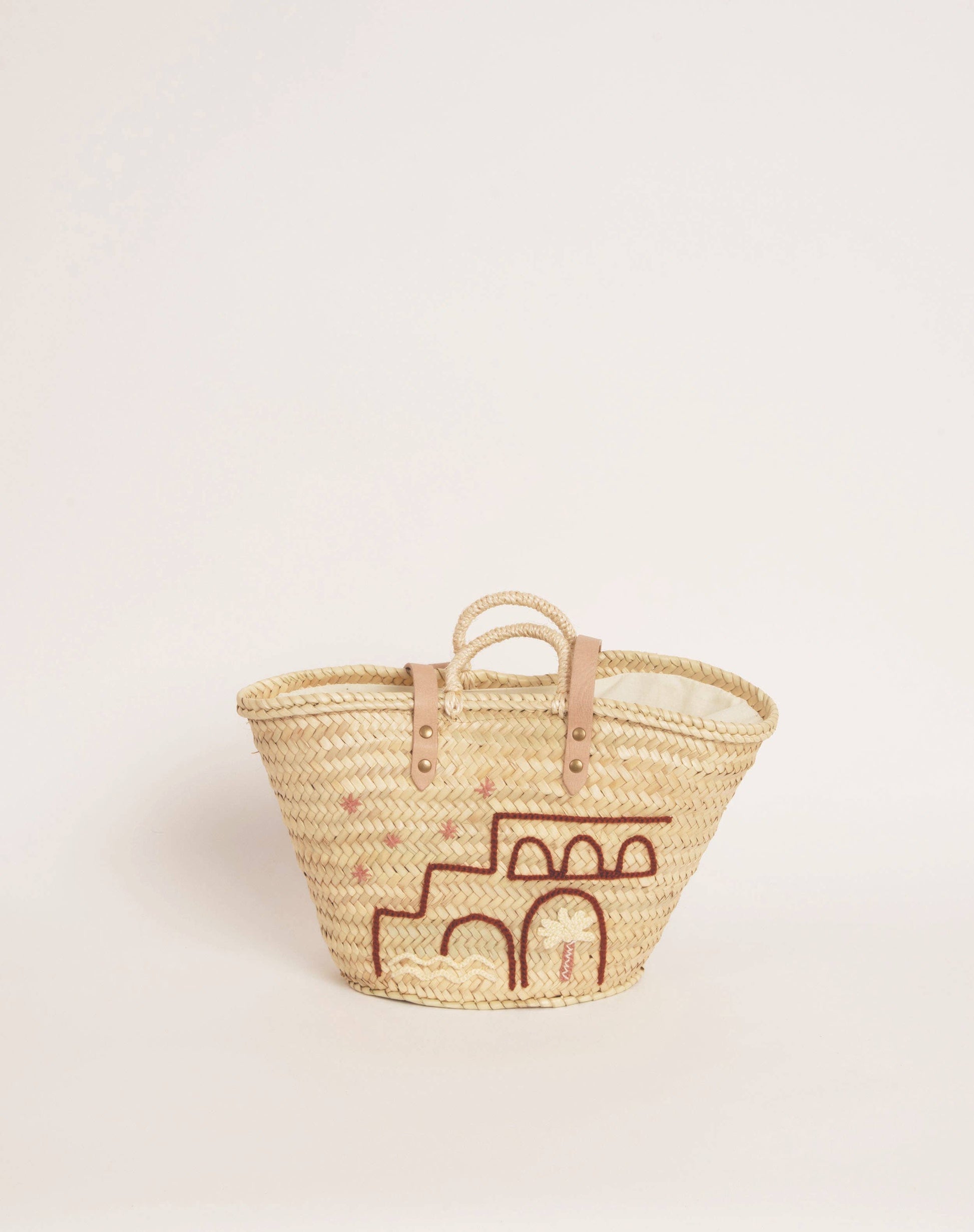 Panier en fibre de palmier tressée à la main avec lanières cuir et broderie rose “Mi casa”