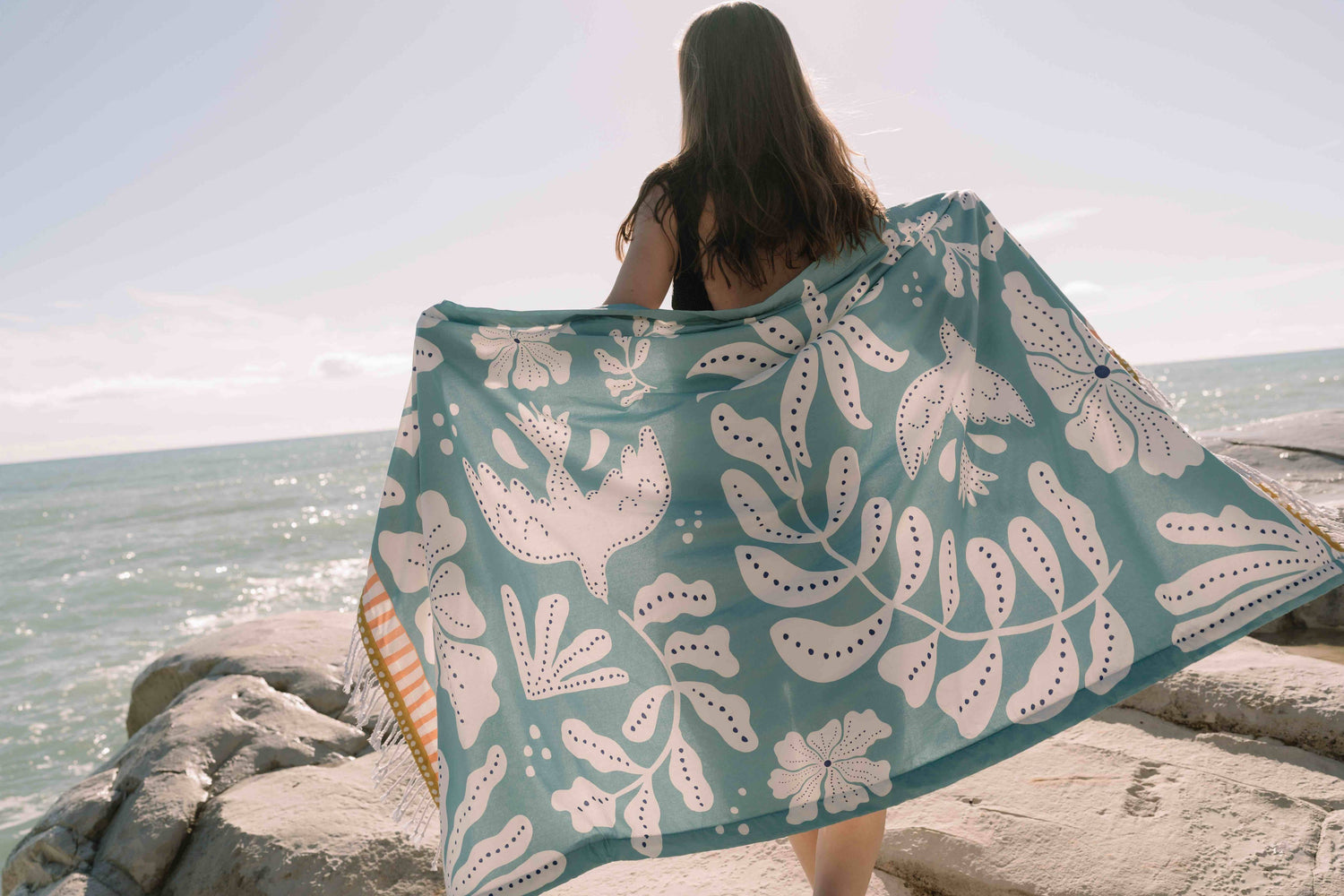 Serviette fouta 100 × 190 cm en coton imprimé et doublée en éponge, style bohème.