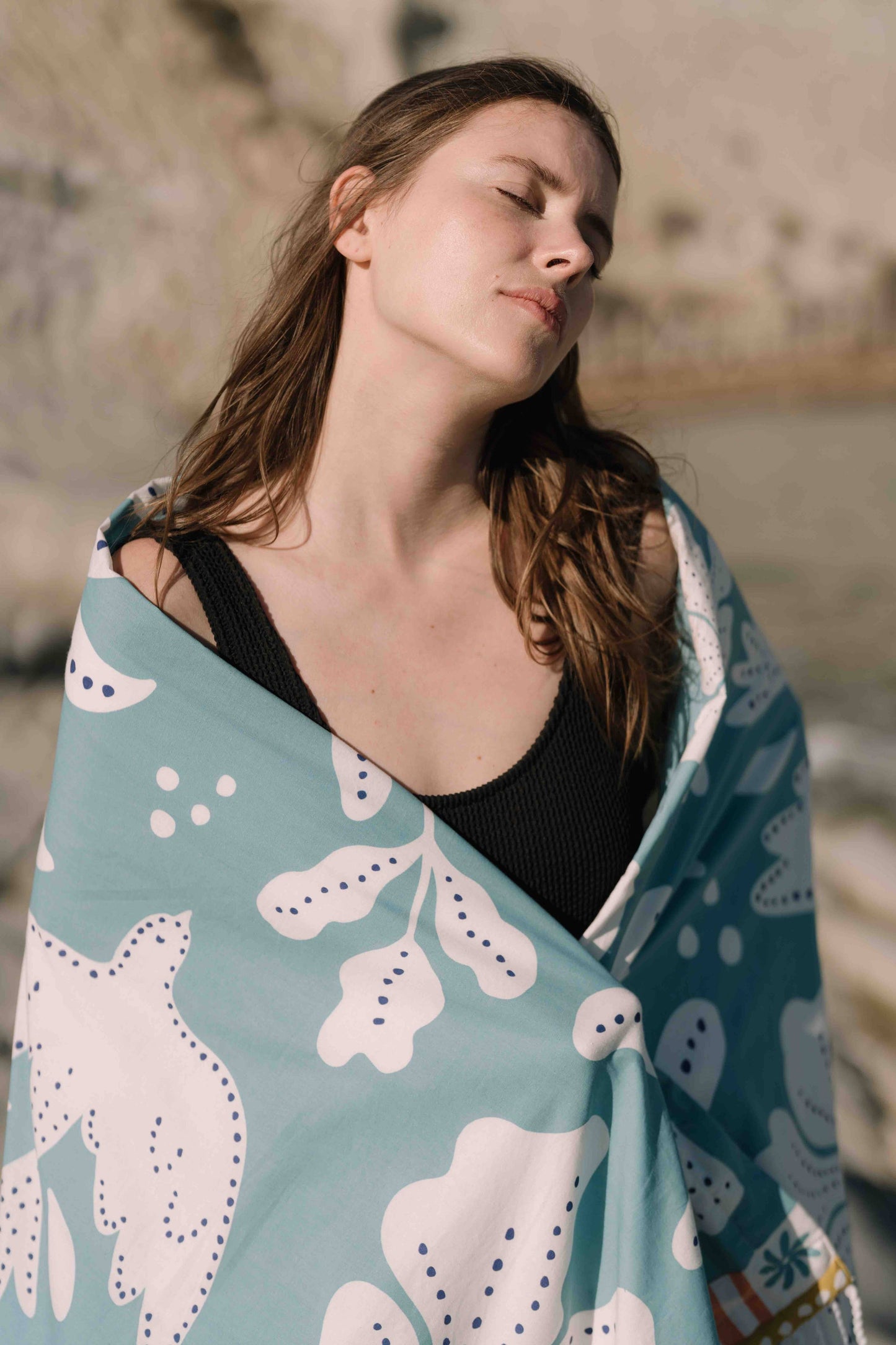 Serviette fouta 100 × 190 cm en coton imprimé et doublée en éponge, style bohème.